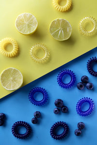 Yellow and blue spirabobbles on matching coloured backgrounds
