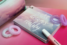 Load image into Gallery viewer, Baby Pink SpiraBobble make your dreams a reality alongside other colours of hair ties called spirabobbles.