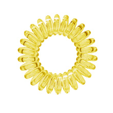 Load image into Gallery viewer, A yellow coloured plastic spiral circular hair bobble on a white background called a spirabobble.
