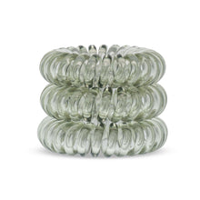 Load image into Gallery viewer, A tower of 3 barely black coloured hair bobbles called spirabobble. A plastic spiral circular hair tie spira bobble.
