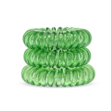 Load image into Gallery viewer, A tower of 3 lime time green coloured hair bobbles called spirabobbles. A green plastic spiral circular hair tie spira bobble.
