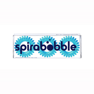 A flat transparent box of 3 Mediterranean Blue coloured hair accessories called spirabobbles