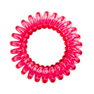 A perfect rose pink coloured plastic spiral circular hair bobble on a white background called a spirabobble.