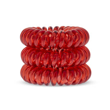 Load image into Gallery viewer, A tower of 3 ruby red coloured hair bobbles called spirabobbles. A plastic spiral circular hair tie spira bobble.
