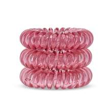 Load image into Gallery viewer, A tower of 3 simply cerise pink coloured hair bobbles called spirabobbles. A plastic spiral circular hair tie spira bobble.
