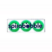 Load image into Gallery viewer, A flat transparent box of 3 lime green coloured hair accessories called spirabobbles