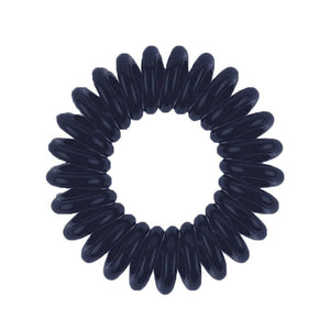A Navy Blue coloured plastic spiral circular hair bobble on a white background called a spirabobble.