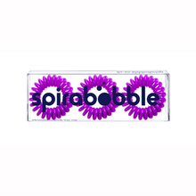 Load image into Gallery viewer, A flat transparent box of 3 purple berry coloured hair accessories called spirabobbles
