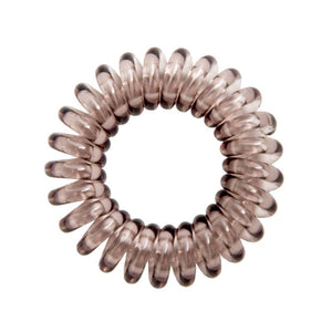 A Terrific Toffee Brown coloured plastic spiral circular hair bobble on a white background called a spirabobble.
