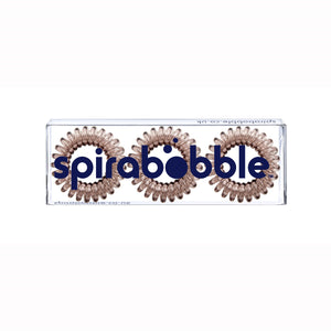 A flat transparent box of 3 Terrific Toffee Brown coloured hair accessories called spirabobbles.
