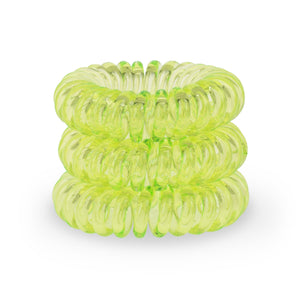 A tower of 3 spring green coloured hair bobbles called spirabobble. A plastic spiral circular hair tie spira bobble.