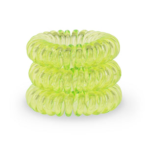 A tower of 3 spring green coloured hair bobbles called spirabobble. A plastic spiral circular hair tie spira bobble.