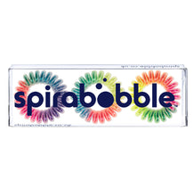 Load image into Gallery viewer, A flat transparent box of 3 rainbow coloured hair accessories called spirabobbles

