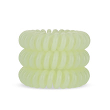 Load image into Gallery viewer, A tower of 3 apple pie green coloured hair bobbles called spirabobble. A plastic spiral circular hair tie spira bobble.
