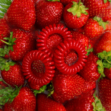 Load image into Gallery viewer, Red Alert SpiraBobble on top of some juicy red strawberries

