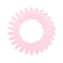 Load image into Gallery viewer, A pale pink coloured plastic spiral circular hair bobble on a white background called a spirabobble.
