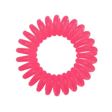 Load image into Gallery viewer, A candy pink coloured plastic spiral circular hair bobble on a white background called a spirabobble.
