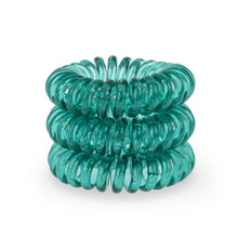 Load image into Gallery viewer, A tower of 3 serene green coloured hair bobbles called spirabobbles. A plastic spiral circular hair tie spira bobble.

