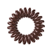 Load image into Gallery viewer, A brown sugar coloured plastic spiral circular hair bobble on a white background called a spirabobble.
