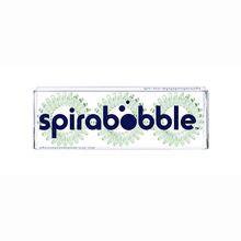 Load image into Gallery viewer, A flat transparent box of 3 apple green coloured hair accessories called spirabobble
