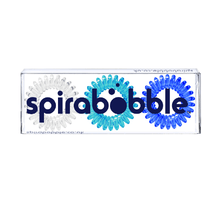 Load image into Gallery viewer, A flat transparent box of 3 blue heaven colour collection coloured hair accessories called spirabobbles
