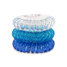 Load image into Gallery viewer, A tower of 3 different coloured hair bobbles called Blue Heaven spirabobbles. A plastic spiral circular hair tie spira bobble.
