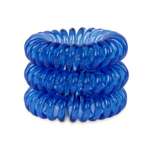 Load image into Gallery viewer, A tower of 3 clearest blue coloured hair bobbles called spirabobbles. A clear blue plastic spiral circular hair tie spira bobble.
