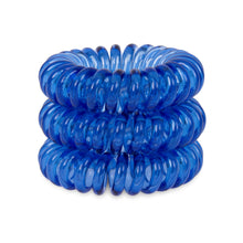 Load image into Gallery viewer, A tower of 3 clearest blue coloured hair bobbles called spirabobbles. A clear blue plastic spiral circular hair tie spira bobble.
