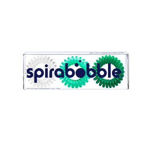 A flat transparent box of 3 clearly green collection coloured hair accessories called spirabobbles