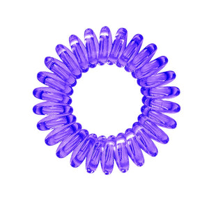 A purple coloured plastic spiral circular hair bobble on a white background called a spirabobble.