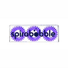 Load image into Gallery viewer, A flat transparent box of 3 purple coloured hair accessories called spirabobbles
