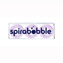 Load image into Gallery viewer, A flat transparent box of 3 light purple coloured hair accessories called spirabobbles
