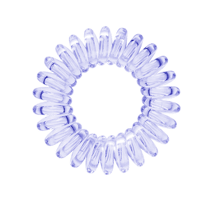 A navy blue clear coloured plastic circular hairband on a white background that looks like an old fashioned curly coiled telephone cable or a coiled spring which has been made into a circular shape