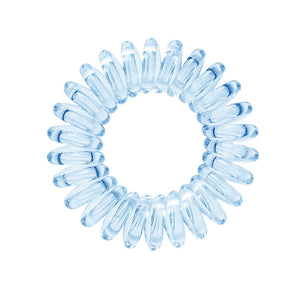 A pale blue coloured plastic spiral circular hair bobble on a white background called a spirabobble.