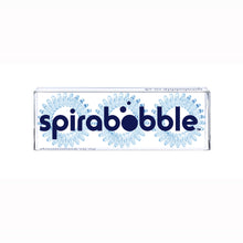 Load image into Gallery viewer, A flat transparent box of 3 pale blue coloured hair accessories called spirabobbles

