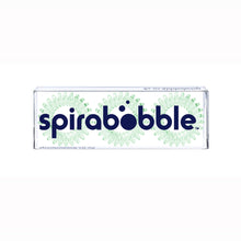 Load image into Gallery viewer, A flat transparent box of 3 pale green coloured hair accessories called spirabobbles
