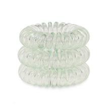 Load image into Gallery viewer, A tower of 3 pale green coloured hair bobbles called spirabobble. A black plastic spiral circular hair tie spira bobble.

