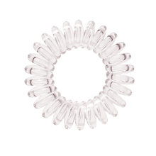 Load image into Gallery viewer, A pale grey coloured plastic spiral circular hair bobble on a white background called a spirabobble.
