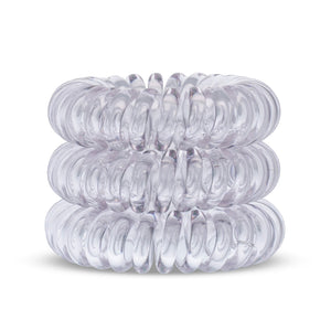 Tower of 3 Pale Grey Hair Bobbles or Hair Ties on a white background