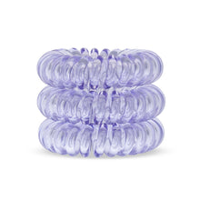 Load image into Gallery viewer, A tower of 3 pale purple coloured hair bobbles called spirabobbles. A plastic spiral circular hair tie spira bobble.
