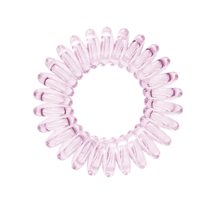 A perfect pink coloured plastic spiral circular hair bobble on a white background called a spirabobble.