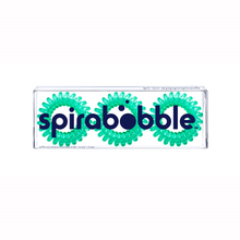 Load image into Gallery viewer, A flat transparent box of 3 pine green coloured hair accessories called spirabobbles
