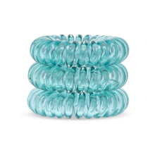 Load image into Gallery viewer, A tower of 3 pine green coloured hair bobbles called spirabobbles. A plastic spiral circular hair tie spira bobble.
