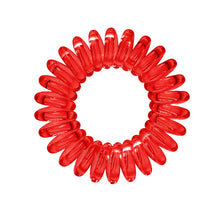 Load image into Gallery viewer, A ruby red coloured plastic spiral circular hair bobble on a white background called a spirabobble.
