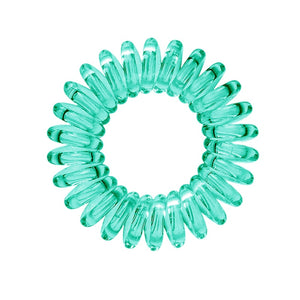 A serene green coloured plastic spiral circular hair bobble on a white background called a spirabobble.