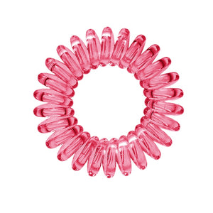 A simply cerise pink coloured plastic spiral circular hair bobble on a white background called a spirabobble.