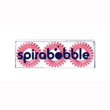 Load image into Gallery viewer, A flat transparent box of 3 simply cerise pink coloured hair accessories called spirabobbles

