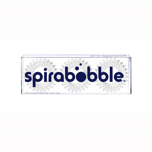 A flat transparent box of 3 transparent clear coloured coloured hair accessories called spirabobbles