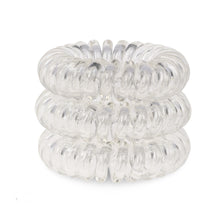 Load image into Gallery viewer, A tower of 3 transparent clear coloured hair bobbles called spirabobbles. A clear plastic spiral circular hair tie spira bobble.
