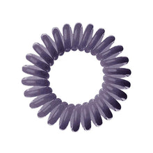Load image into Gallery viewer, A dark grey solid coloured plastic circular hairband on a white background that looks like an old fashioned curly coiled telephone cable or a coiled spring which has been made into a circular shape
